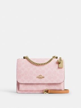 Coach Outlet Klare Crossbody Bag In Signature Canvas With Charms